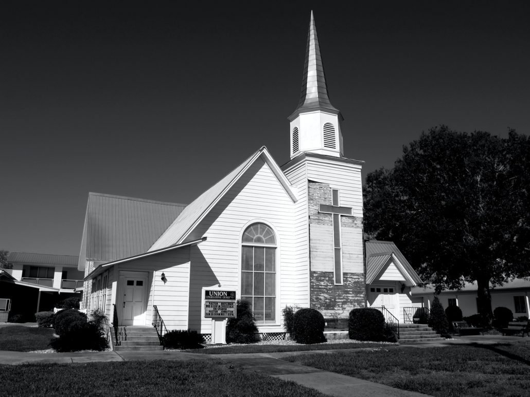 grayscale photography of parish